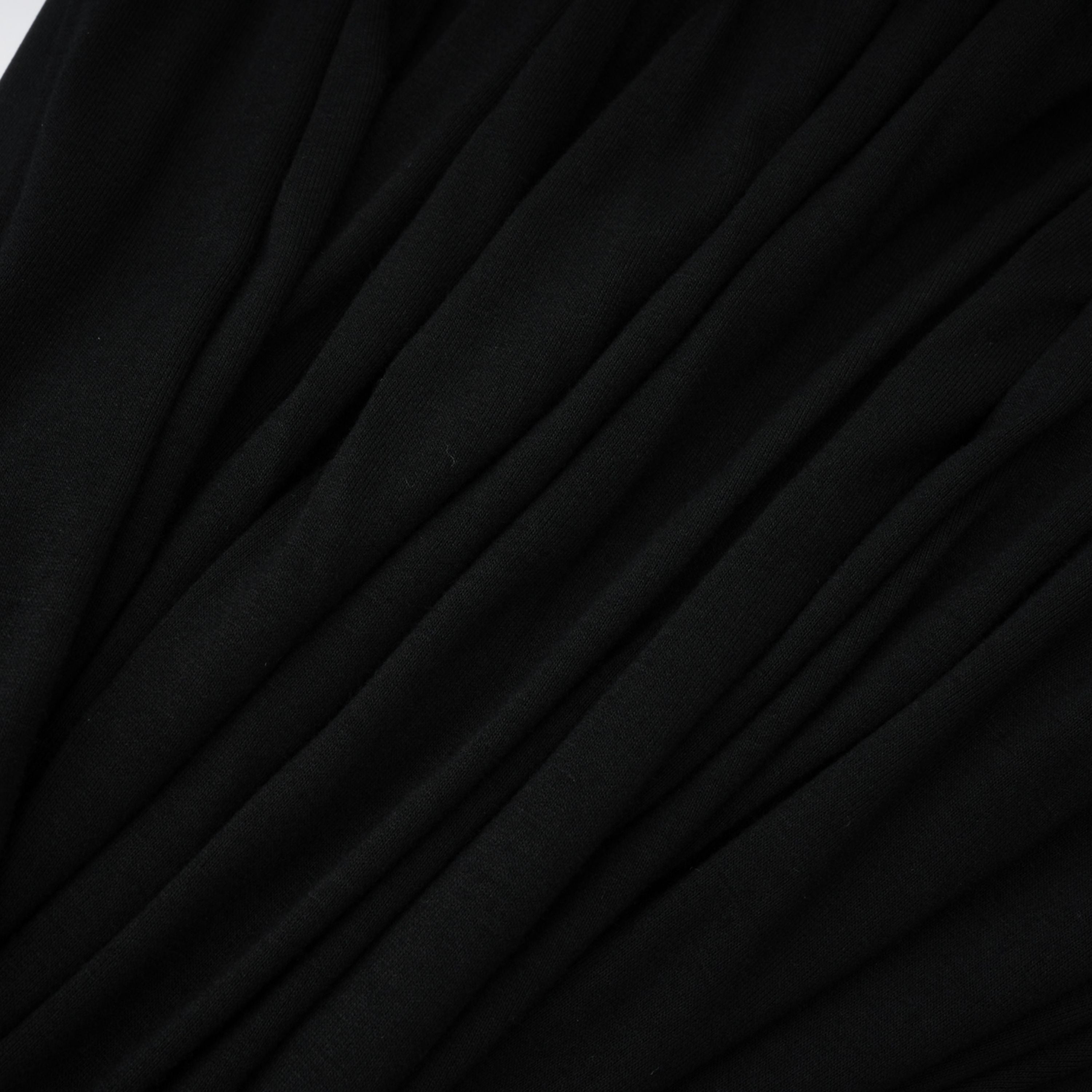 Gianina Schwarzer Jumpsuit mit tiefem V-Ausschnitt und Drapierung