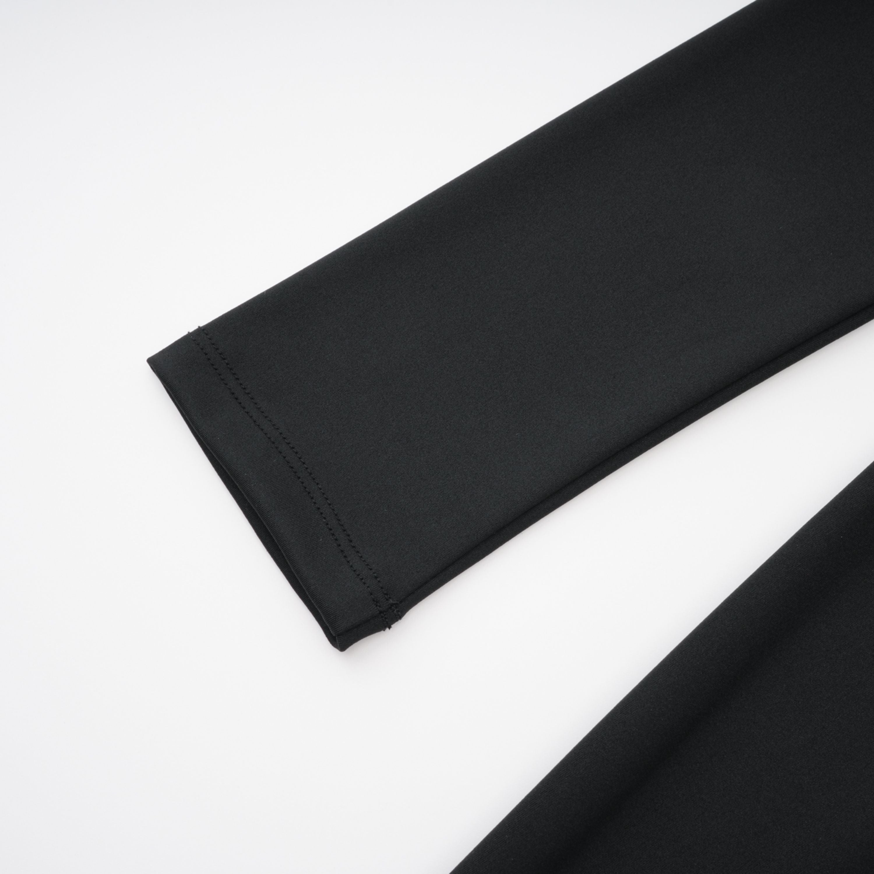 Gianina Schwarzer Jumpsuit mit tiefem V-Ausschnitt und Drapierung